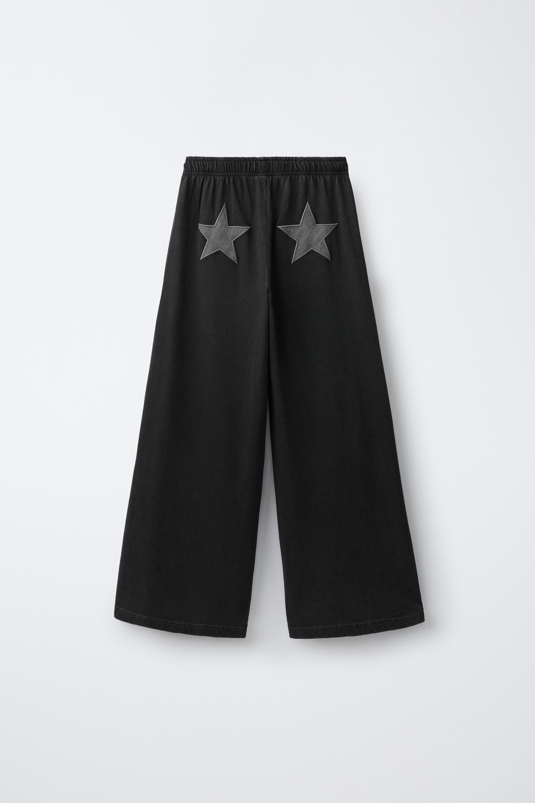 WASHED EFFECT STAR WIDE-LEG PANTS